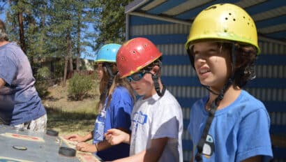 Boys wearing helmets.