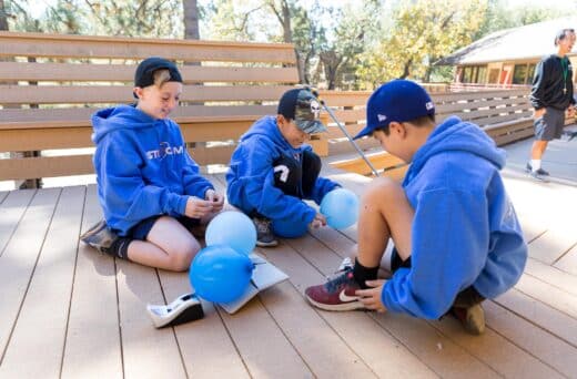 Boys with balloons.