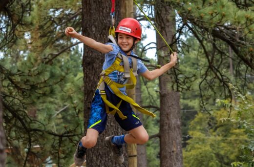 Boy ziplining.