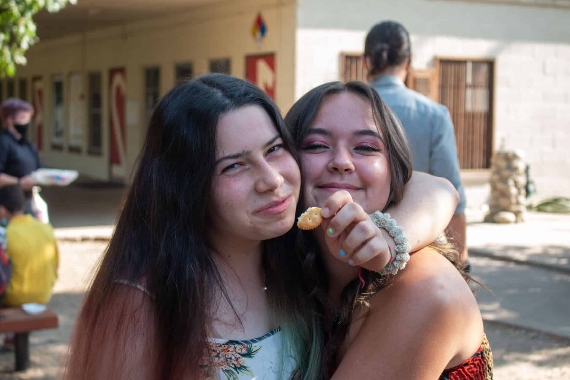 Two girls smiling.