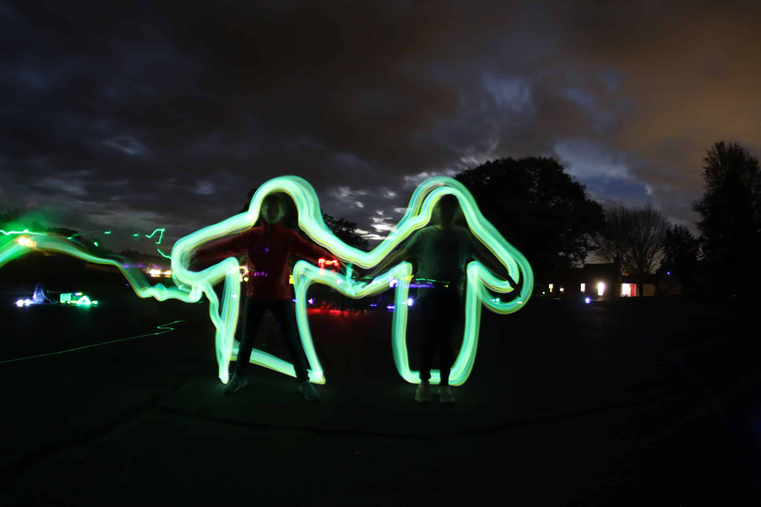 Two people with neon outline.