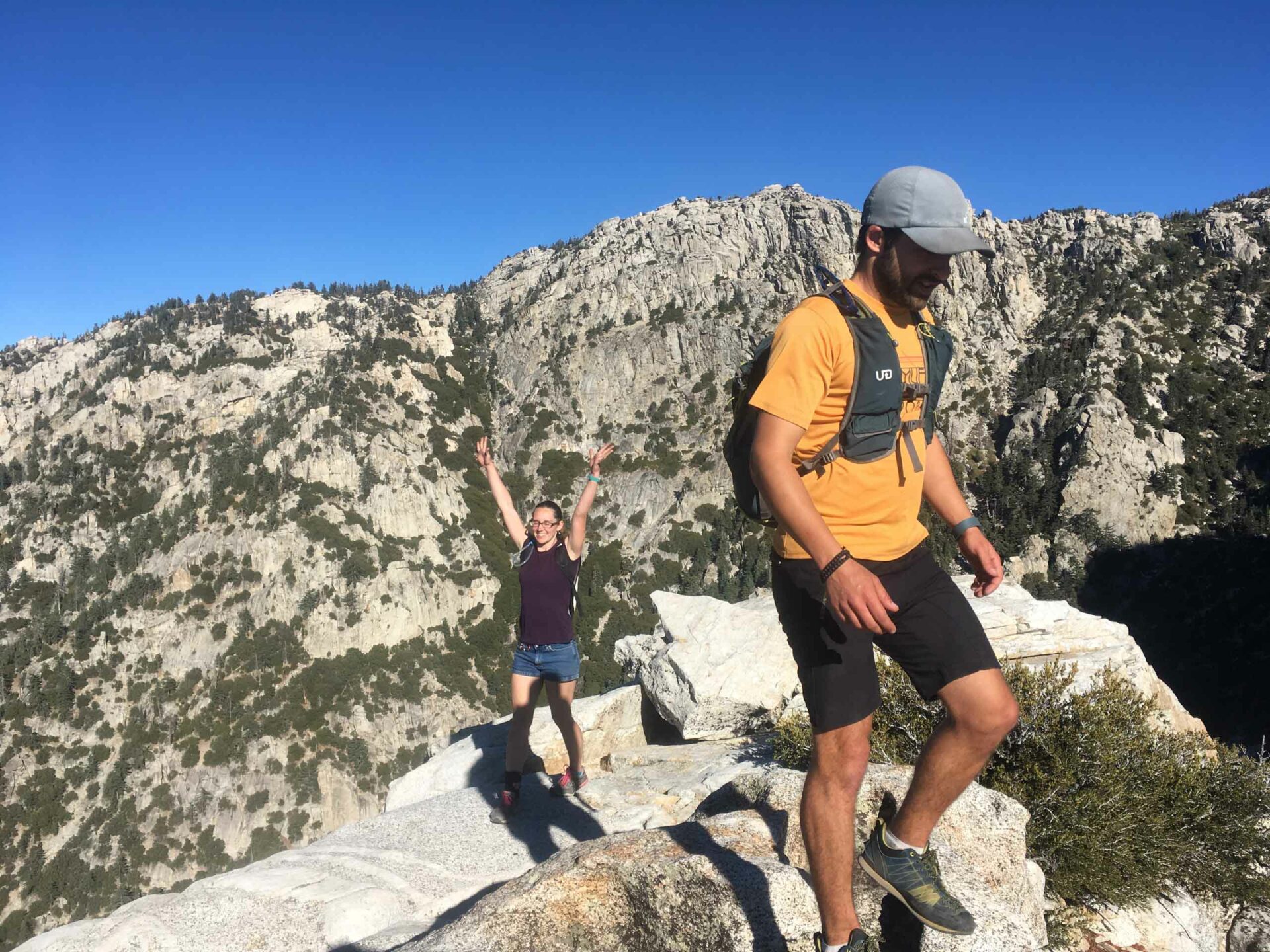 Two people on rocks.